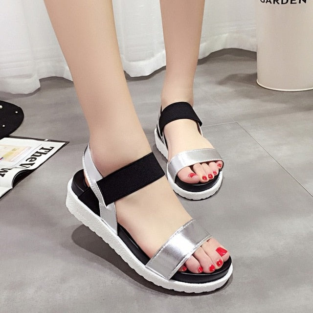 Sandals with elastic buckle and thick sole